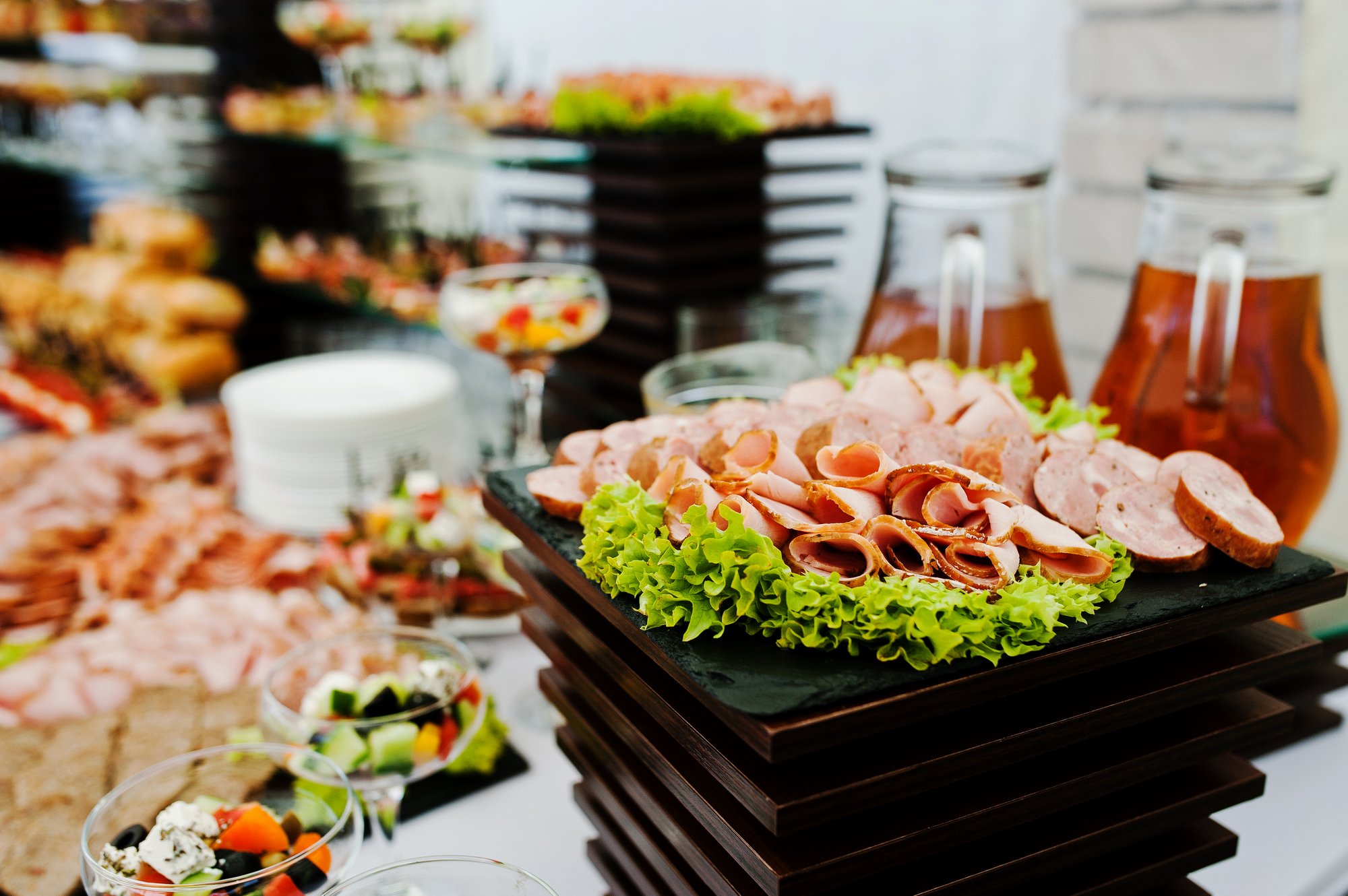 buffet-table-reception-with-burgers-cold-snacks-meat-salads